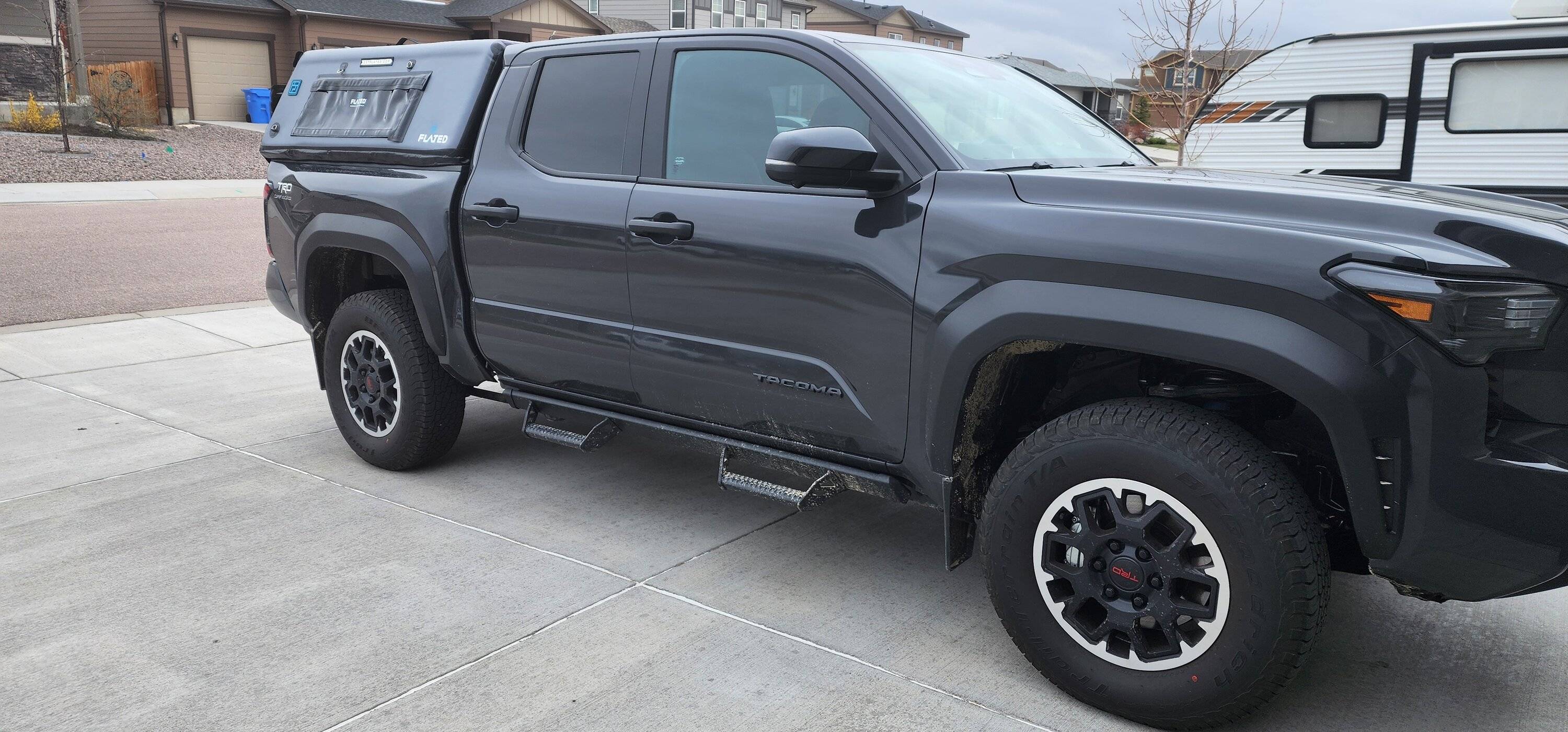 2024 Tacoma Anyone considering a bed cap topper? 20240419_172809