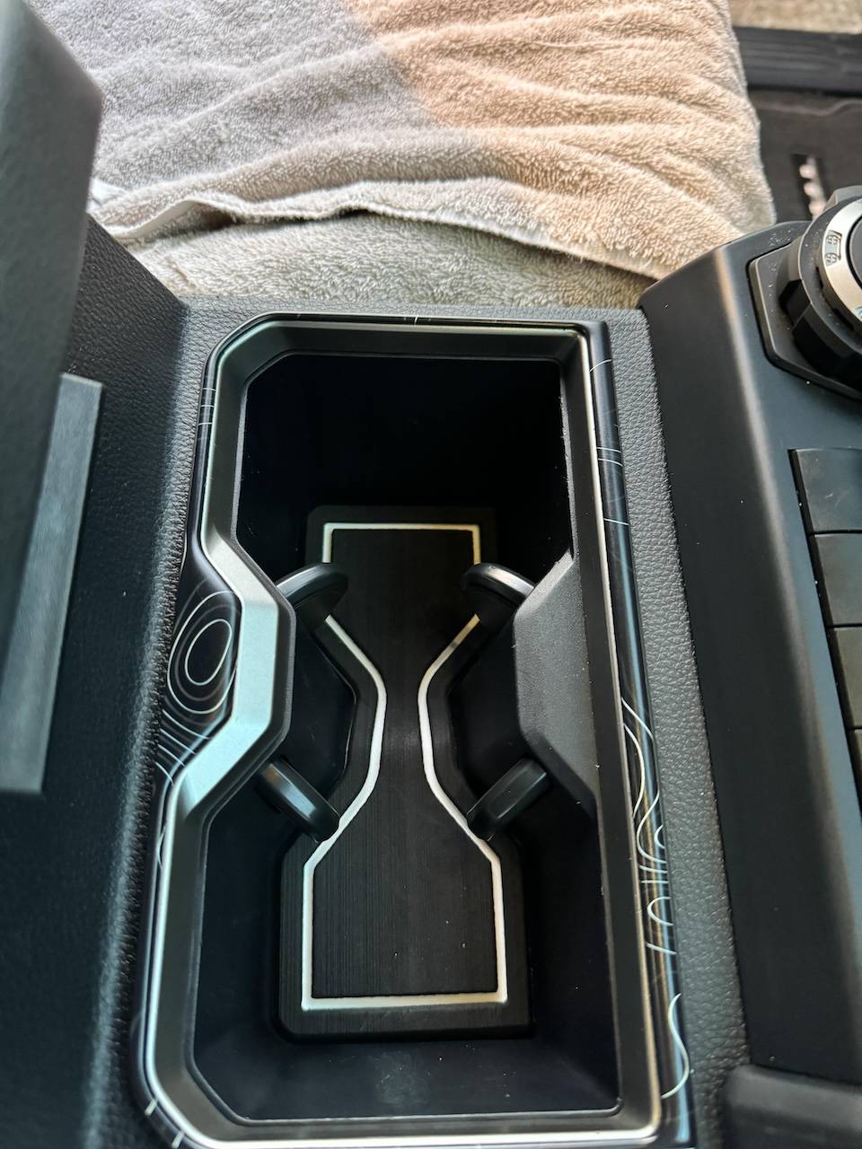 2024 Tacoma First round of TUFSKINZ trim installed! CupHolderBorderDone