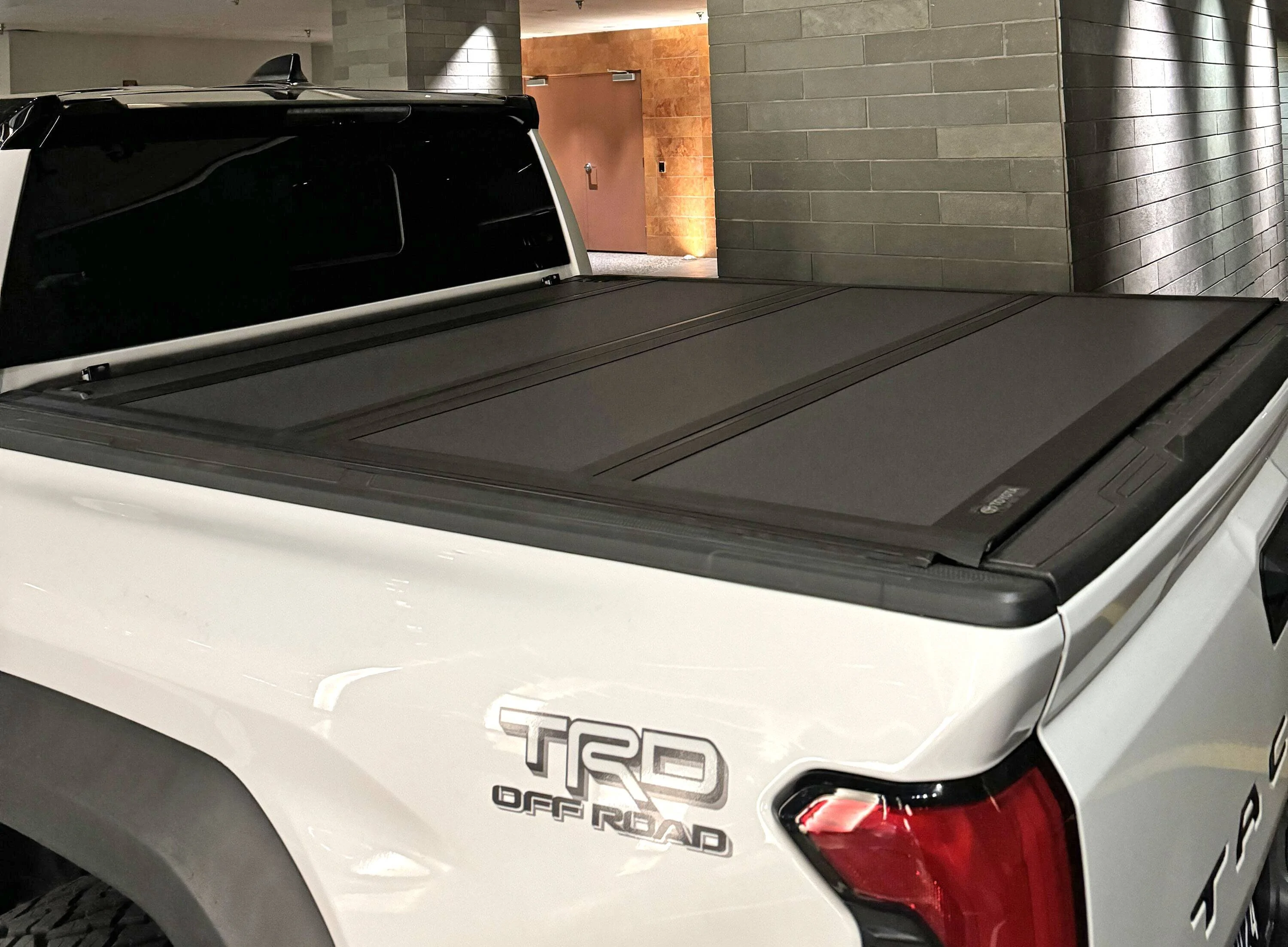 2024 Tacoma OEM Trifold Hard Tonneau Cover PT954-35240 installed on 2024 Tacoma IMG_2434