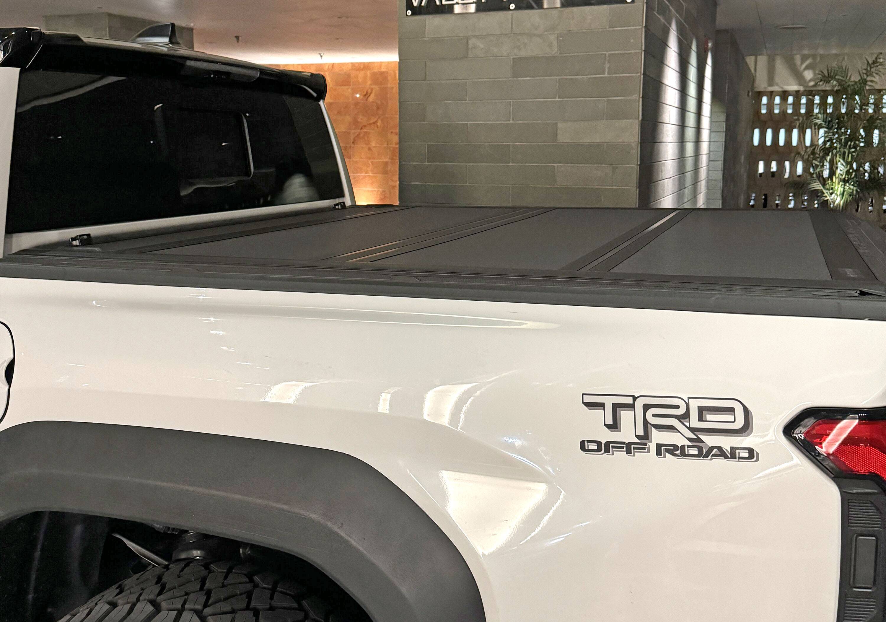 2024 Tacoma OEM Trifold Hard Tonneau Cover PT954-35240 installed on 2024 Tacoma IMG_2435