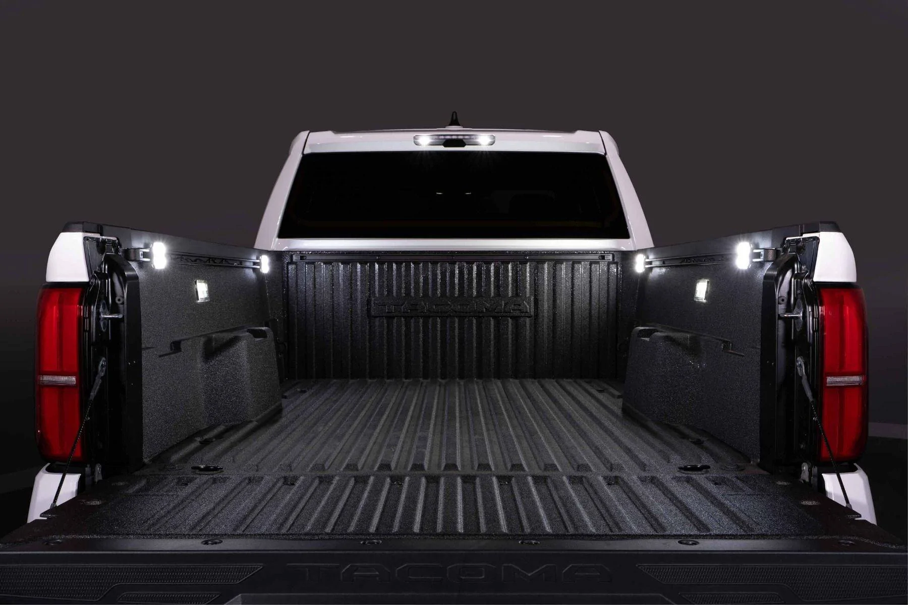 2024_toyota_tacoma_straight_bed_light_on_1.jpg