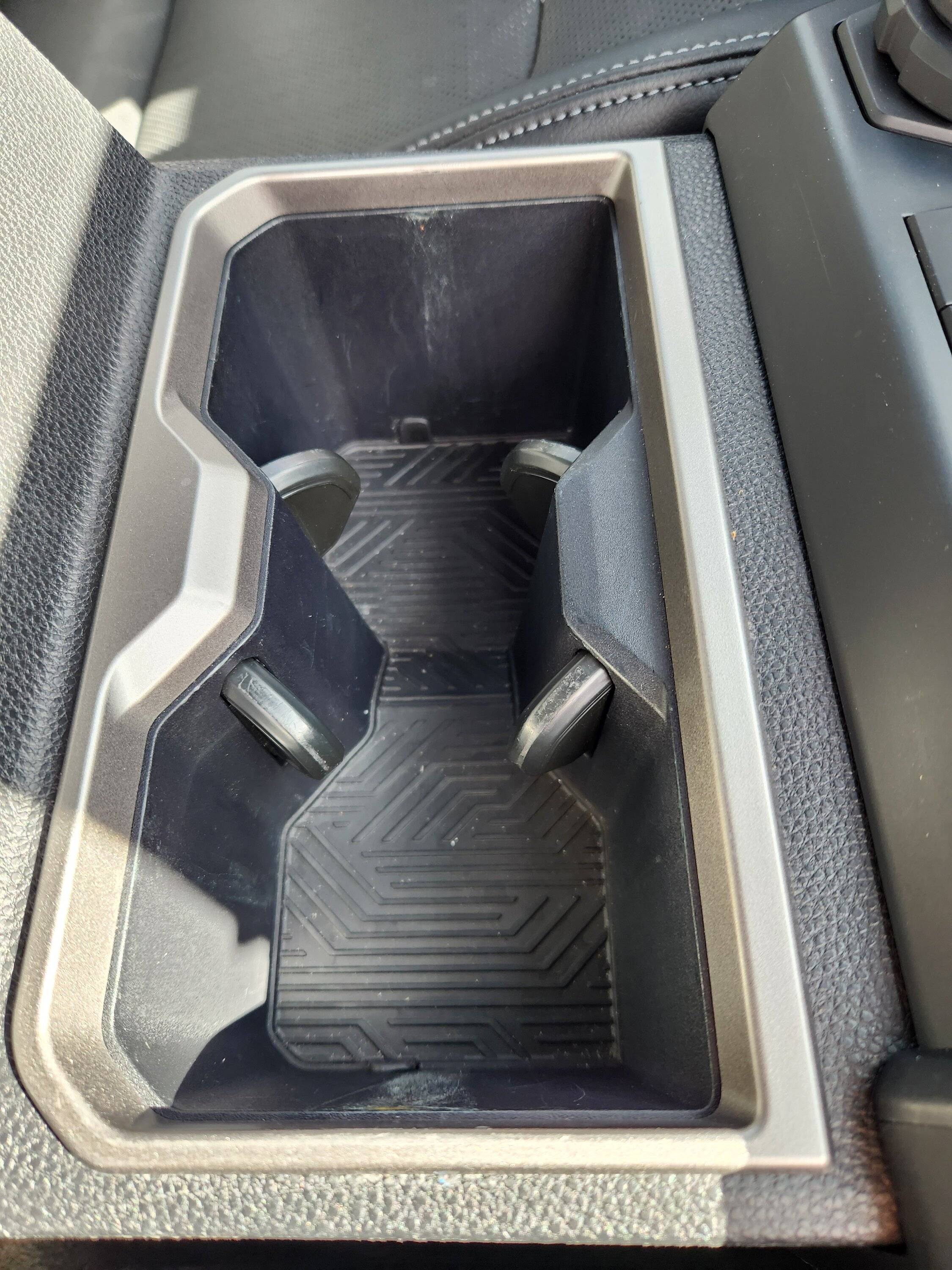 2024 Tacoma Muslogy front and rear cupholder inserts installed Cupholder (2)