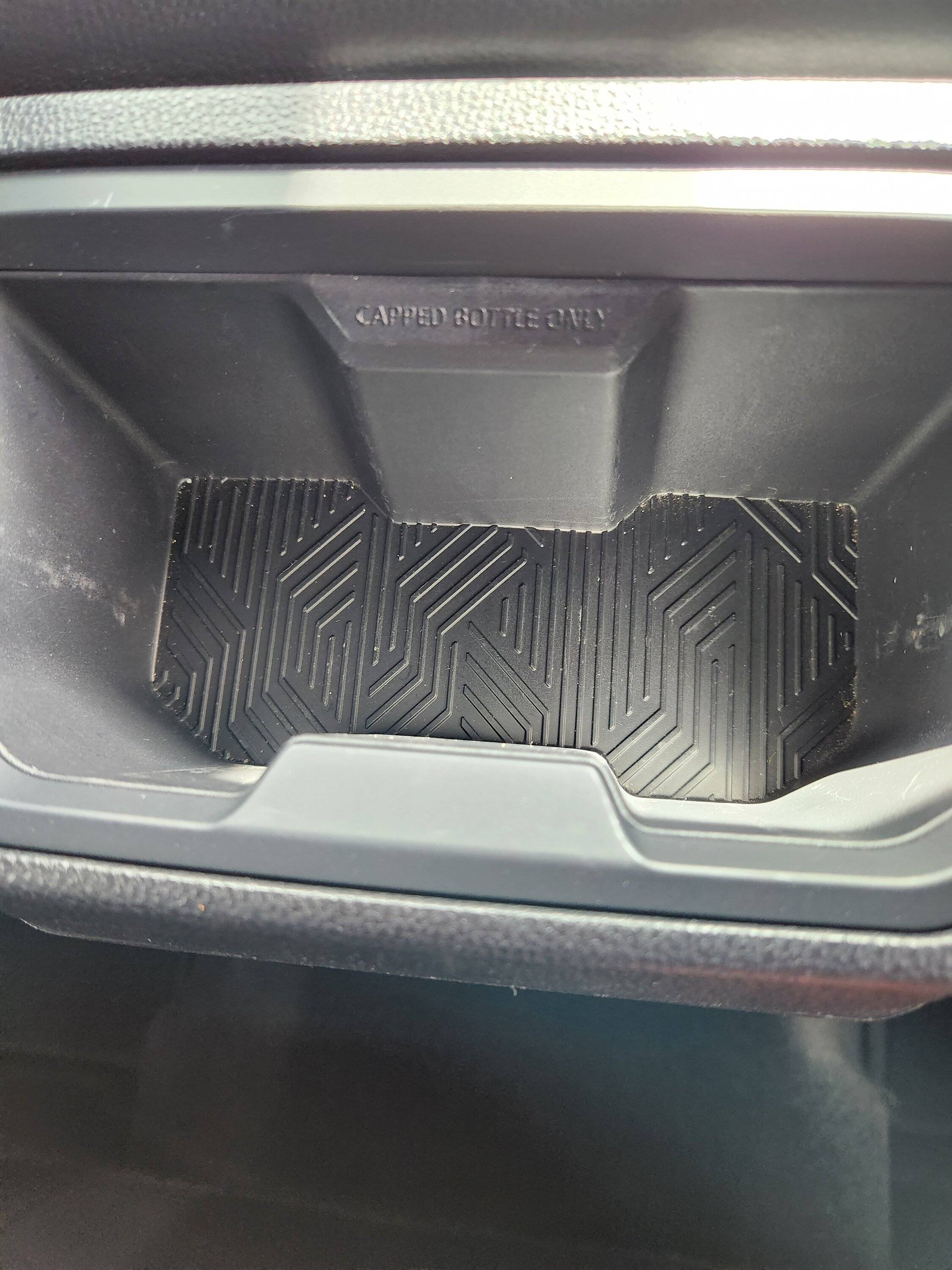 2024 Tacoma Muslogy front and rear cupholder inserts installed Cupholder (5)