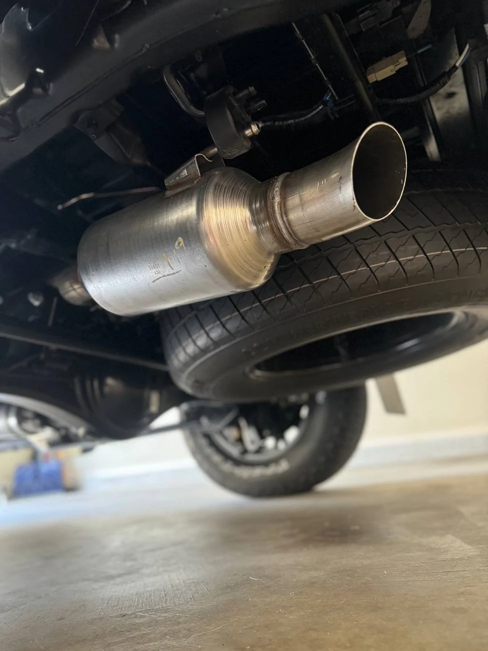 2024 Tacoma Cut exhaust just past the rear resonator on 2024 Tacoma Limited IMG_0611
