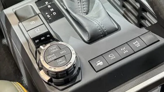 2024 Tacoma What are these two plugs in my Aux switch row? 1727831016967-7