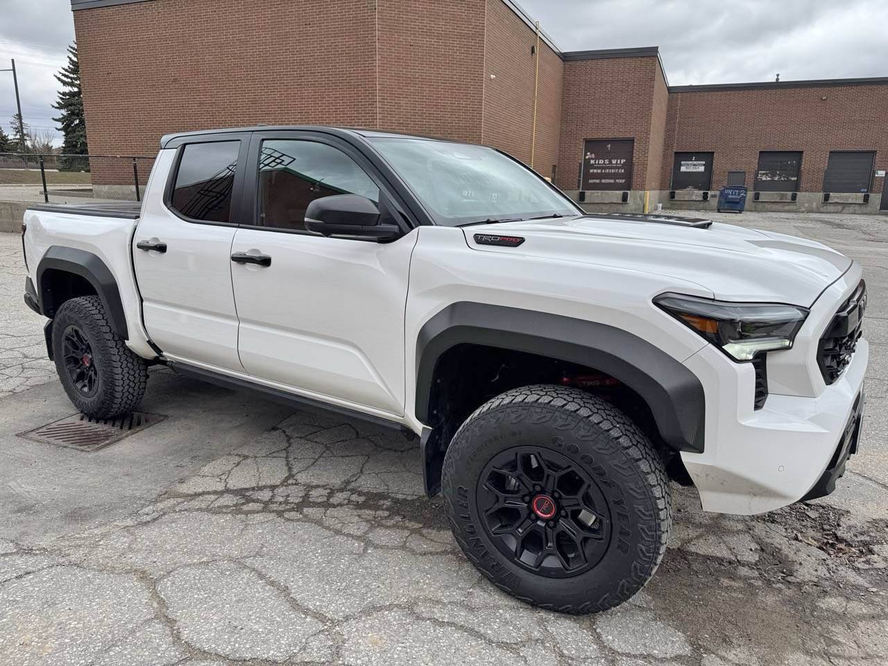 2024 Tacoma 3M carbon fiber wrap on fender flares - White TRD Pro IMG_3451 Lar