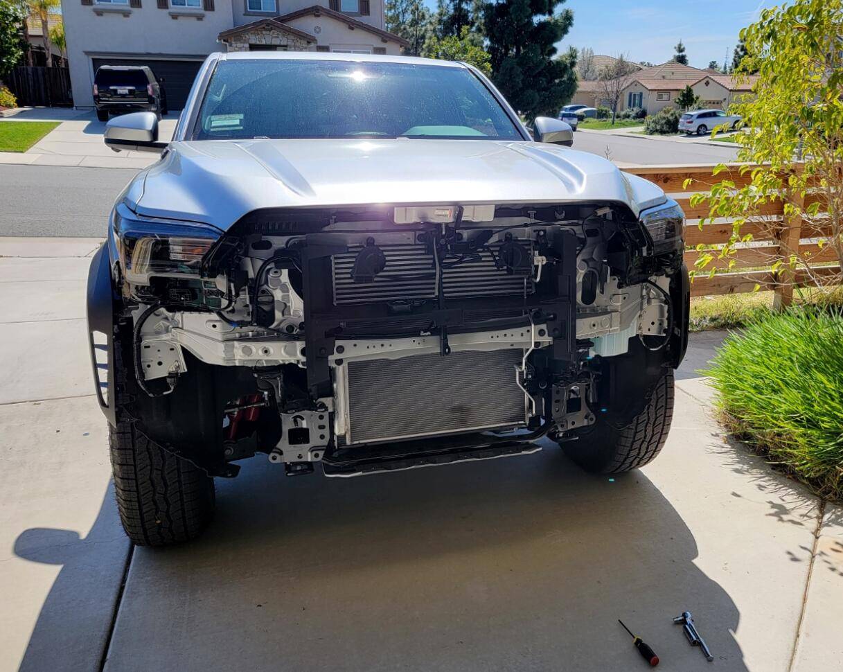 2024 Tacoma Rough Country Winch Mount + Badlands 12k (HF) install on a 4th Gen 2024 Tacoma Hybrid TRD Off-Road. Minimal trimming, huge PITA, but yessir! 1743360153097-n9