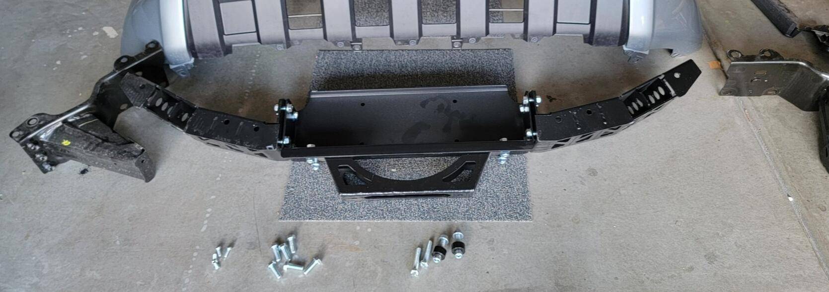 2024 Tacoma Rough Country Winch Mount + Badlands 12k (HF) install on a 4th Gen 2024 Tacoma Hybrid TRD Off-Road. Minimal trimming, huge PITA, but yessir! 1743360314936-q