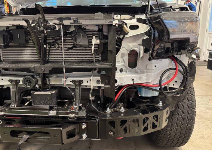 2024 Tacoma Rough Country Winch Mount + Badlands 12k (HF) install on a 4th Gen 2024 Tacoma Hybrid TRD Off-Road. Minimal trimming, huge PITA, but yessir! 1743363127740-l