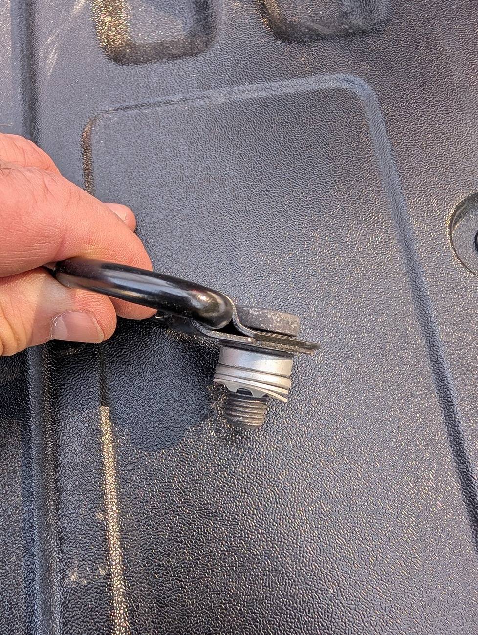 2024 Tacoma TripleAliners Bed Mat installed Temporarily remove the washers and spacers