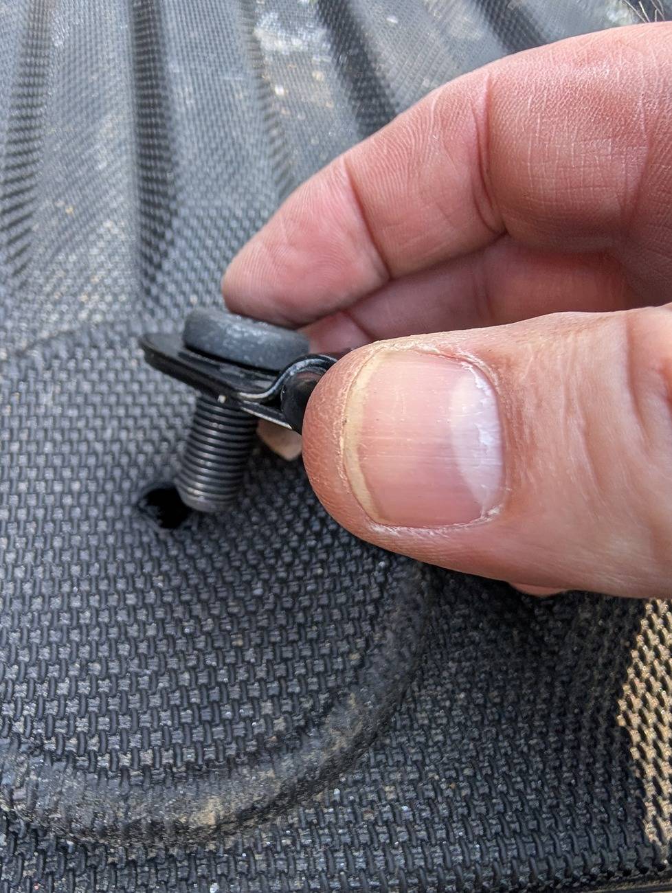 2024 Tacoma TripleAliners Bed Mat installed Poke it thorugh a hole you drill in the ctr of the mat circle