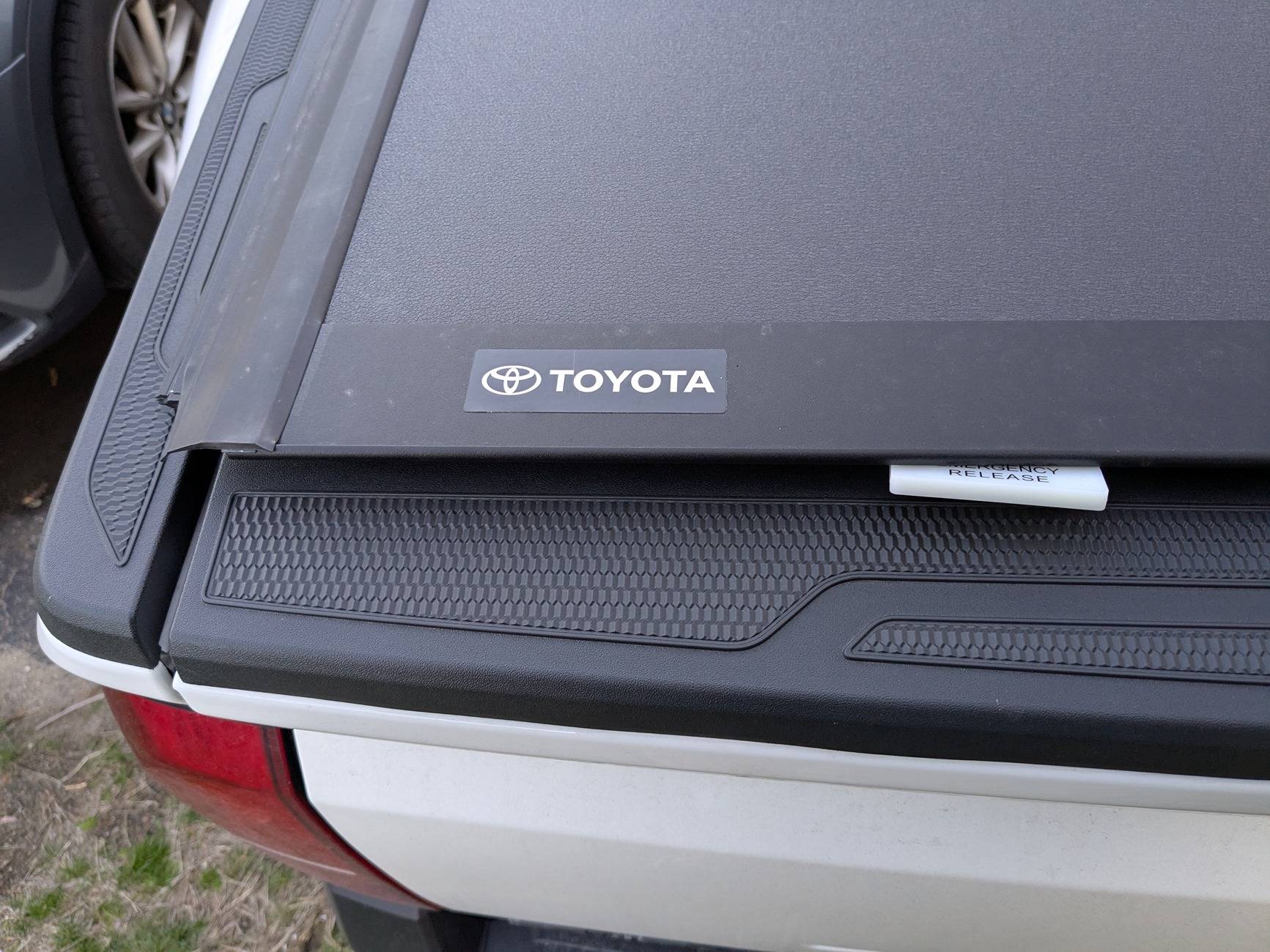 2024 Tacoma Tonneau cover emergency handle delete 1000019716