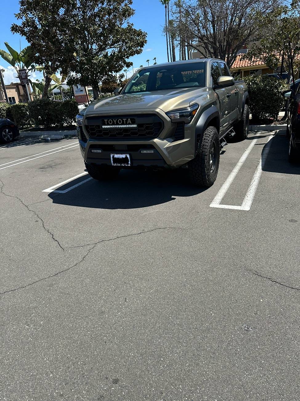 2024 Tacoma Cali Raised LED 20” light bar install on heritage grille IMG_8682