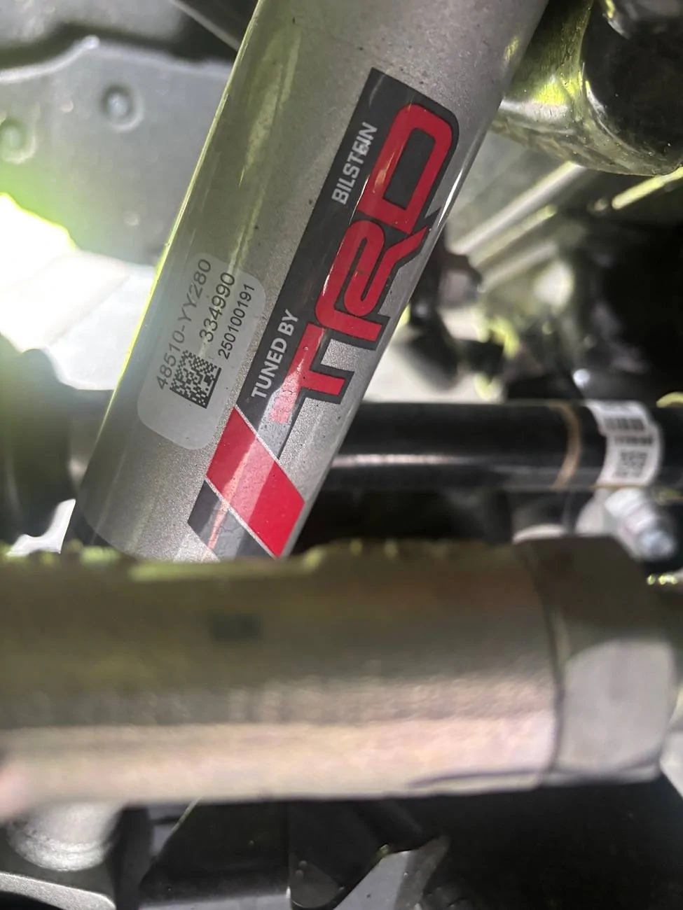 2024 Tacoma TRD Lift Kit (factory OEM) on 2025 TRD Off-Road Premium underground IMG_5213