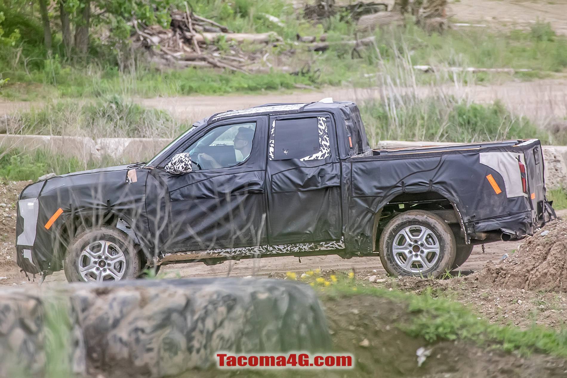 2024 Tacoma New 2024 Tacoma (4th Next Gen) Mule Off-Road Testing Reveals More Suspension Details -- 5/27/22 2024 Toyota Tacoma 4th gen spy photos suspension interior 22