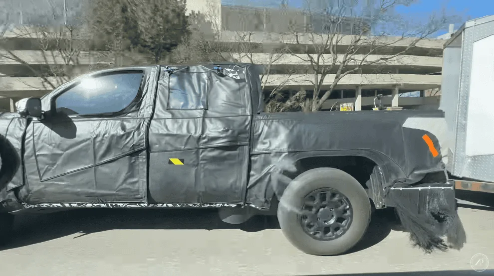 2024 Tacoma Video: 2024 Tacoma Prototype Caught Towing Trailer on Michigan Streets Screenshot 2023-05-01 at 4.41.31 PM