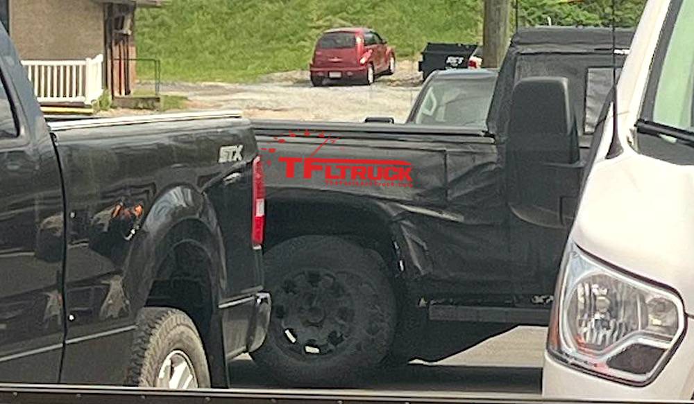 2024 Tacoma 2024 Tacoma Trailhunter Prototype Spied with Possible Long Bed 2024-toyota-tacoma-trailhunter-proto-rear-wheel