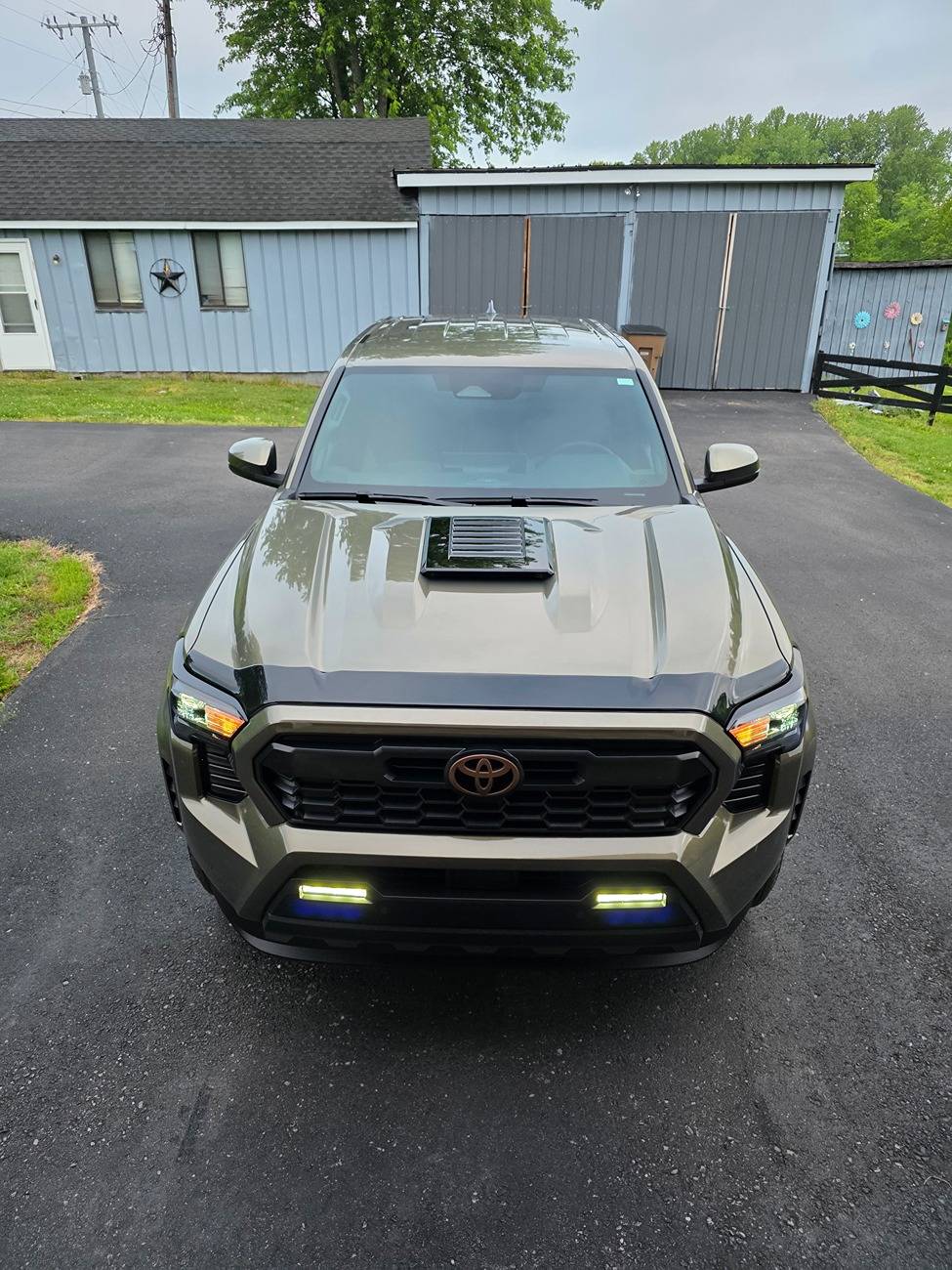2024 Tacoma Black Sport Hood on Bronze Oxide TRD Off Road 1000038304