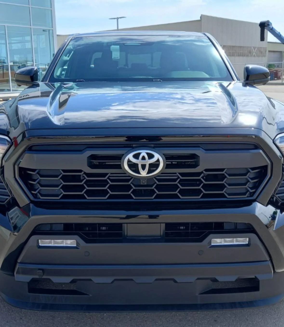 2024 Tacoma Anyone know the part number for the 2025 Hybrid TRD off road OEM upper grill with camera? IMG_7472