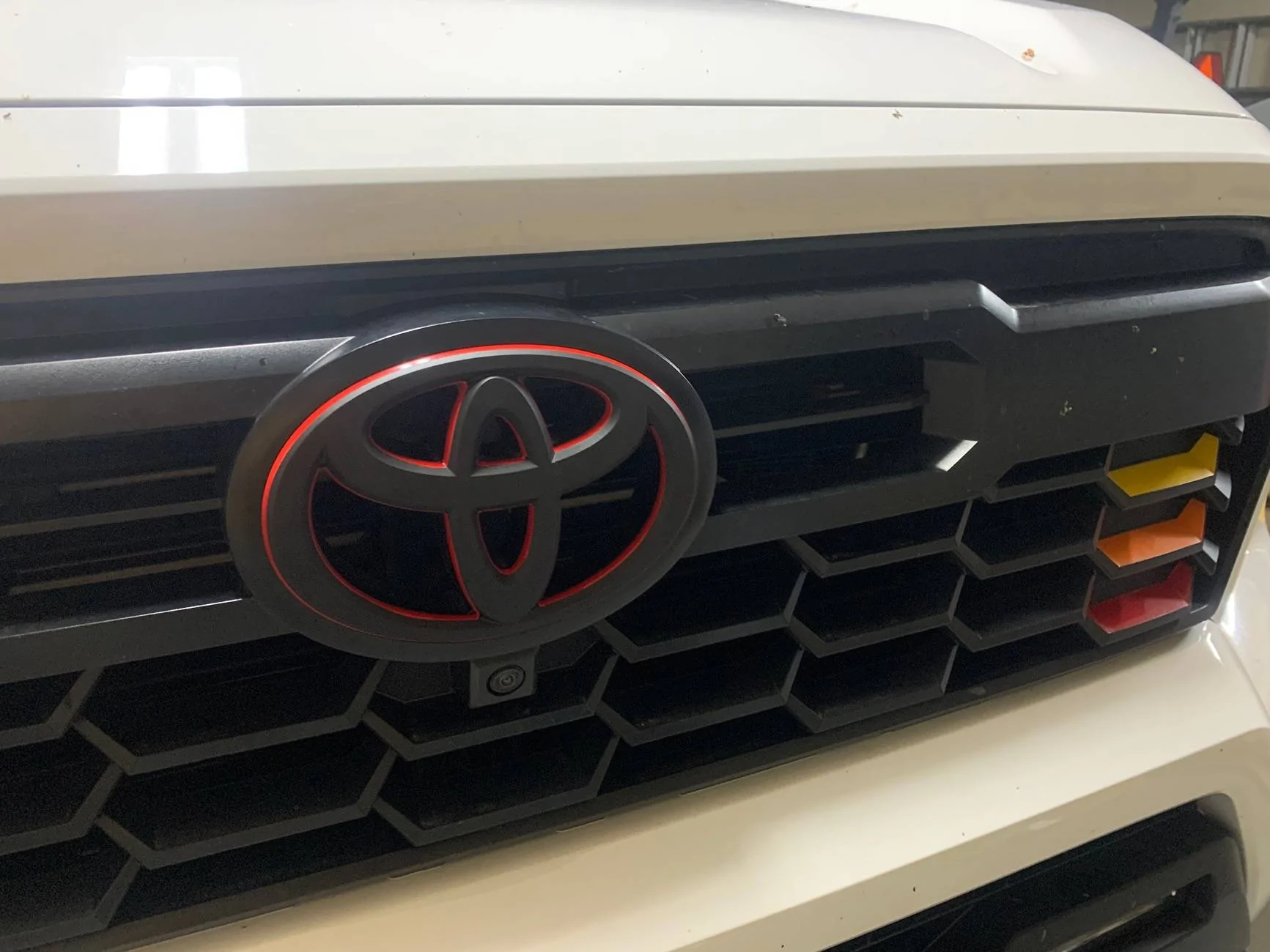 2024 Tacoma Blackout badge customized with red accent FF9D5F4F-6ECA-4BEE-9EF2-7AF6EB812C49