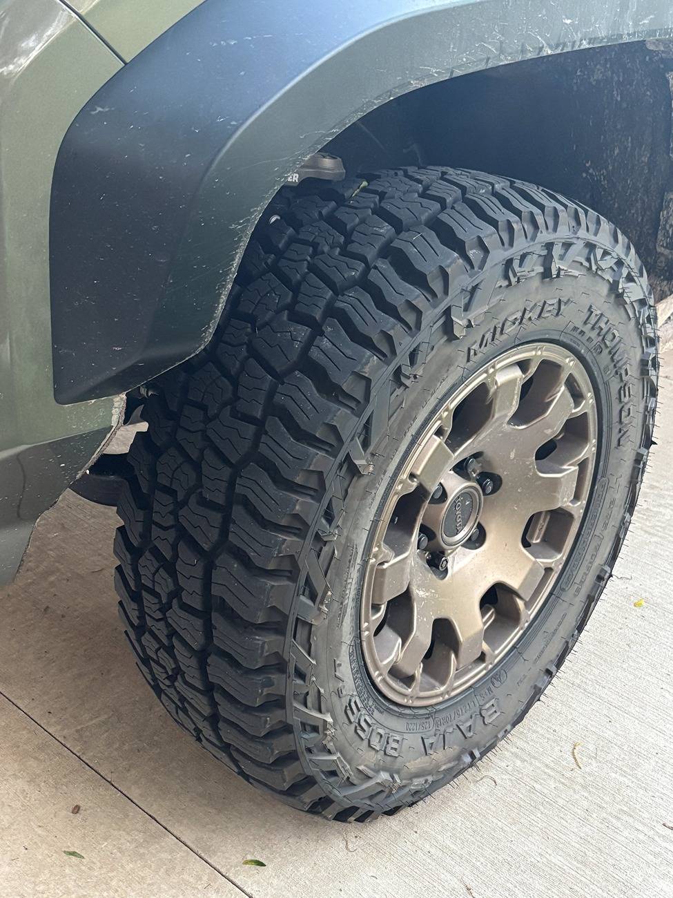 2024 Tacoma Trailhunter - Replaced the OEM Rim Protectors (Tires) w/ Mickey Thompson Baja Boss A/T LT275/70R18 (34") Trailhunter - 34x10.JPG