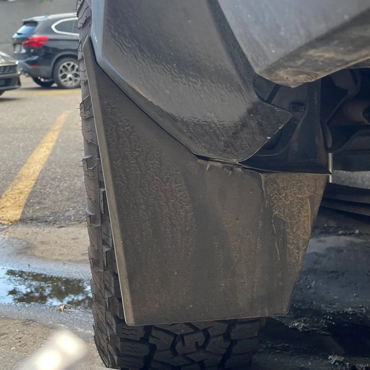 2024 Tacoma OEM mudflaps. Canada vs US. IMG_9340
