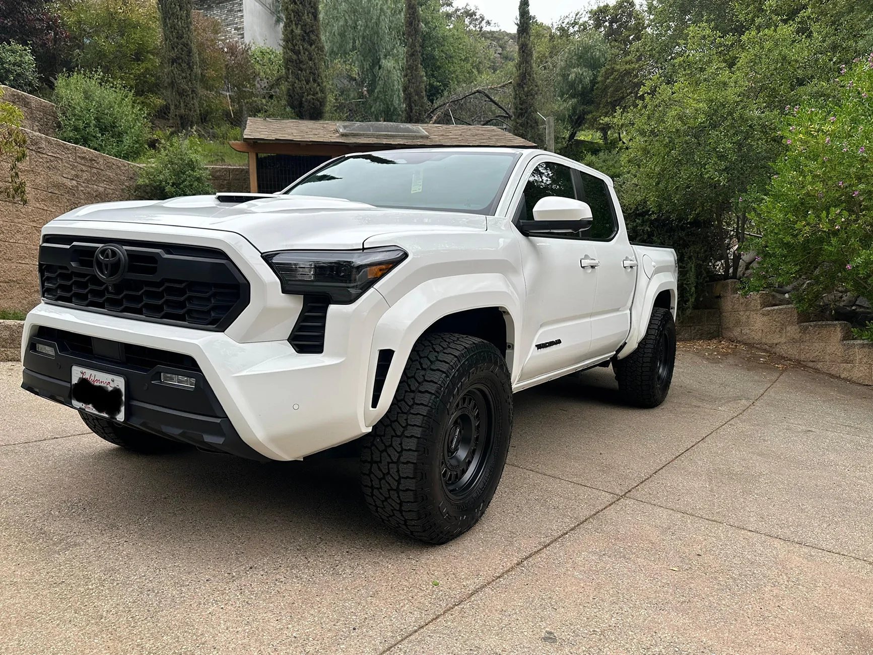 2024 Tacoma Looking at rough country fender flares- need help with tire and offset fitment unnamed