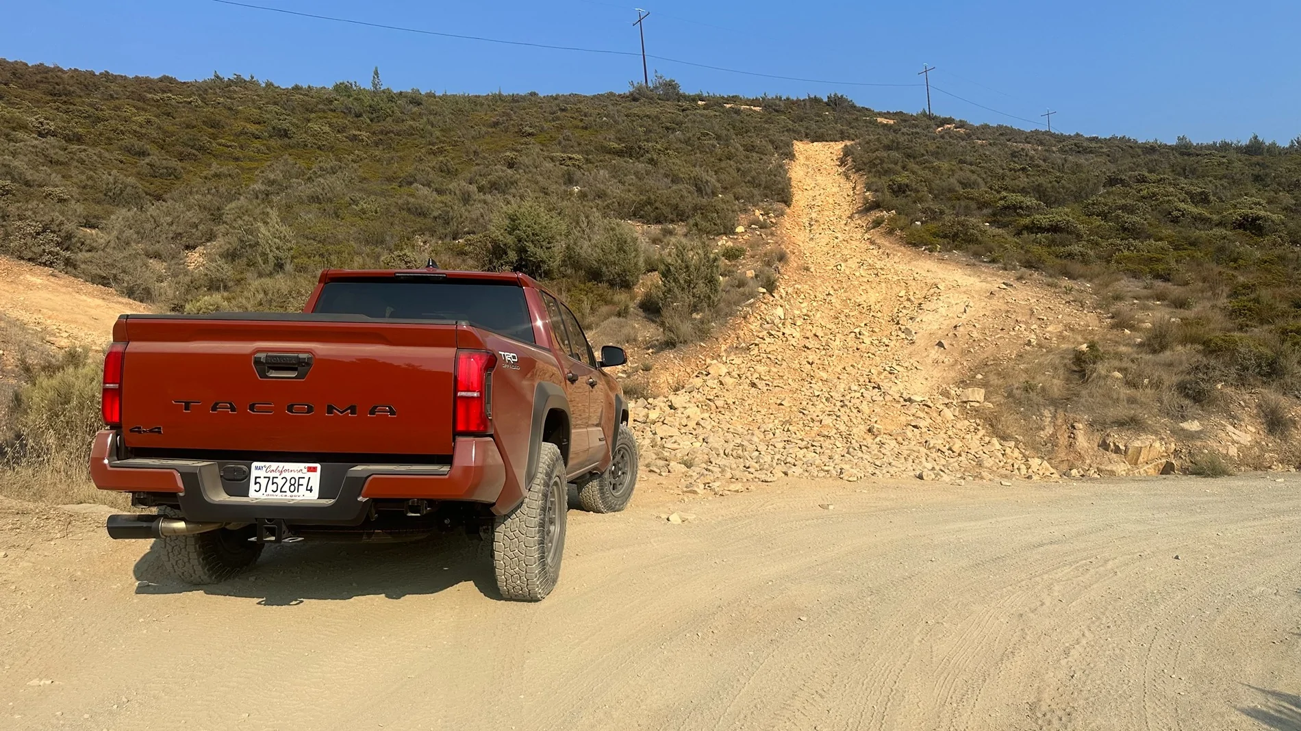 2024 Tacoma Rutsy's Terra Off Road with Pizza Cutters - Toyo Open Country 255/80/17 with Method 705 +35 in Titanium IMG_1656