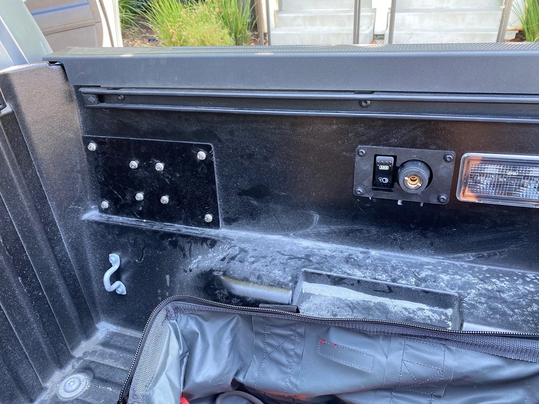 2024 Tacoma Hidden ARB Brushless Single Air Compressor installed in bed IMG_3184