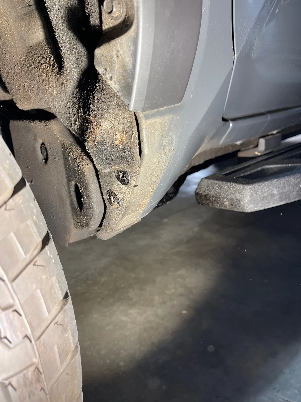 2024 Tacoma Wheel arc liner / carpet, mudflap bolt IMG_1233
