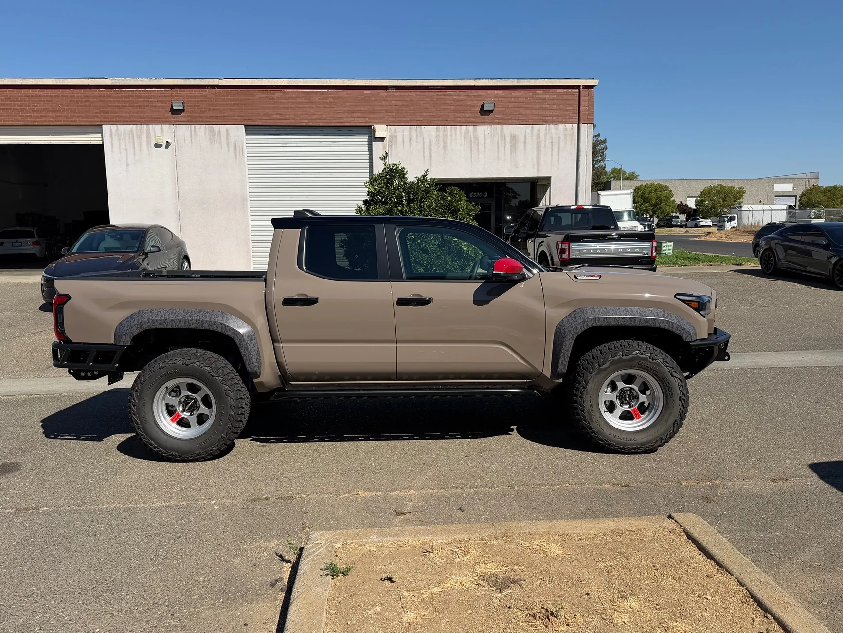 2024 Tacoma TRD Pro camo enhancements - wrap on fender flares and tailgate IMG_0044