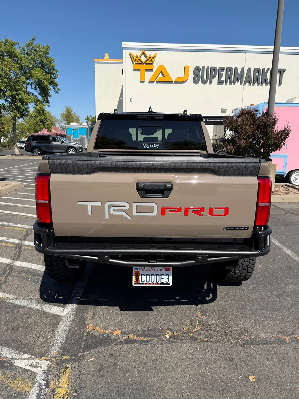 2024 Tacoma TRD Pro camo enhancements - wrap on fender flares and tailgate IMG_0050