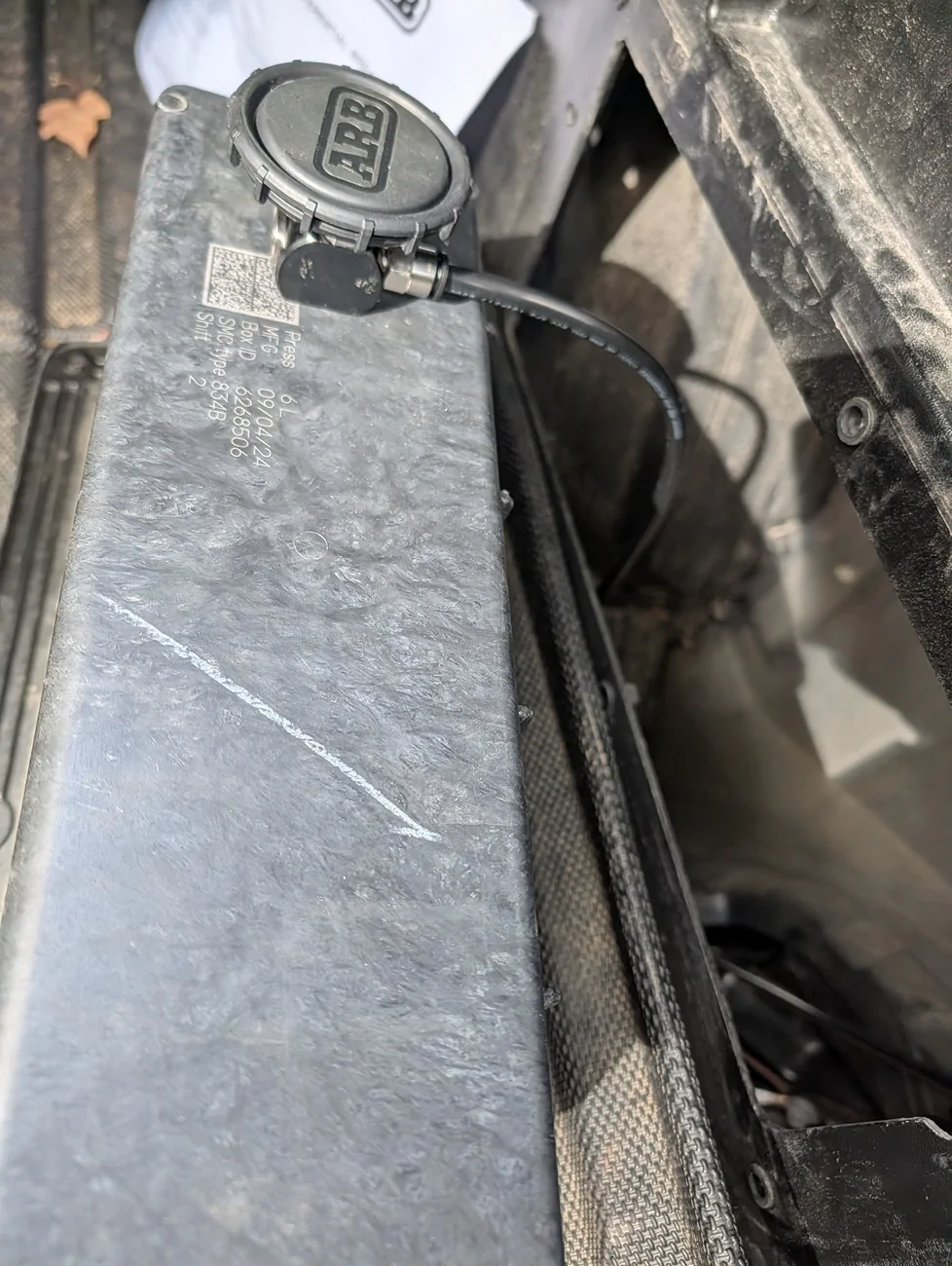 Breather installed on back side of compartment.webp