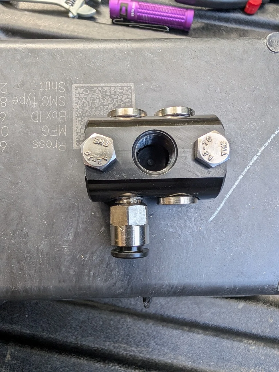 Breather installed on back side of compartment v2.webp