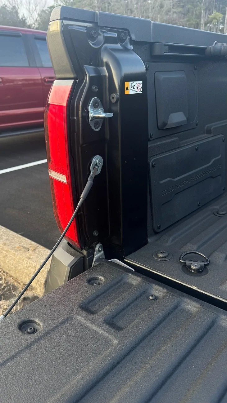 2024 Tacoma Bed stiffeners incompatible with power tailgate IMG_1980