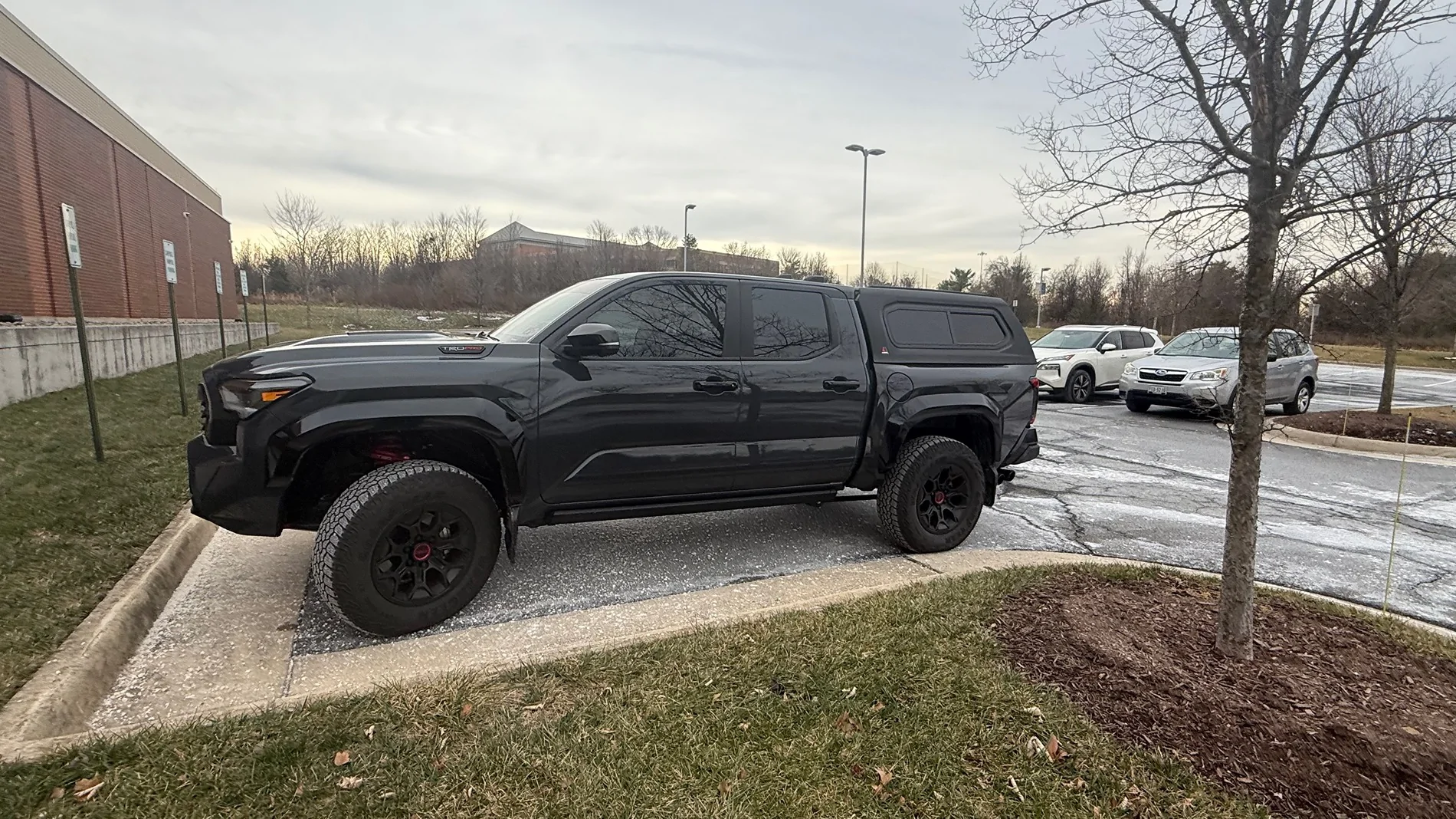 2024 Tacoma Leer 100xr Truck Cap installed FullSizeRender