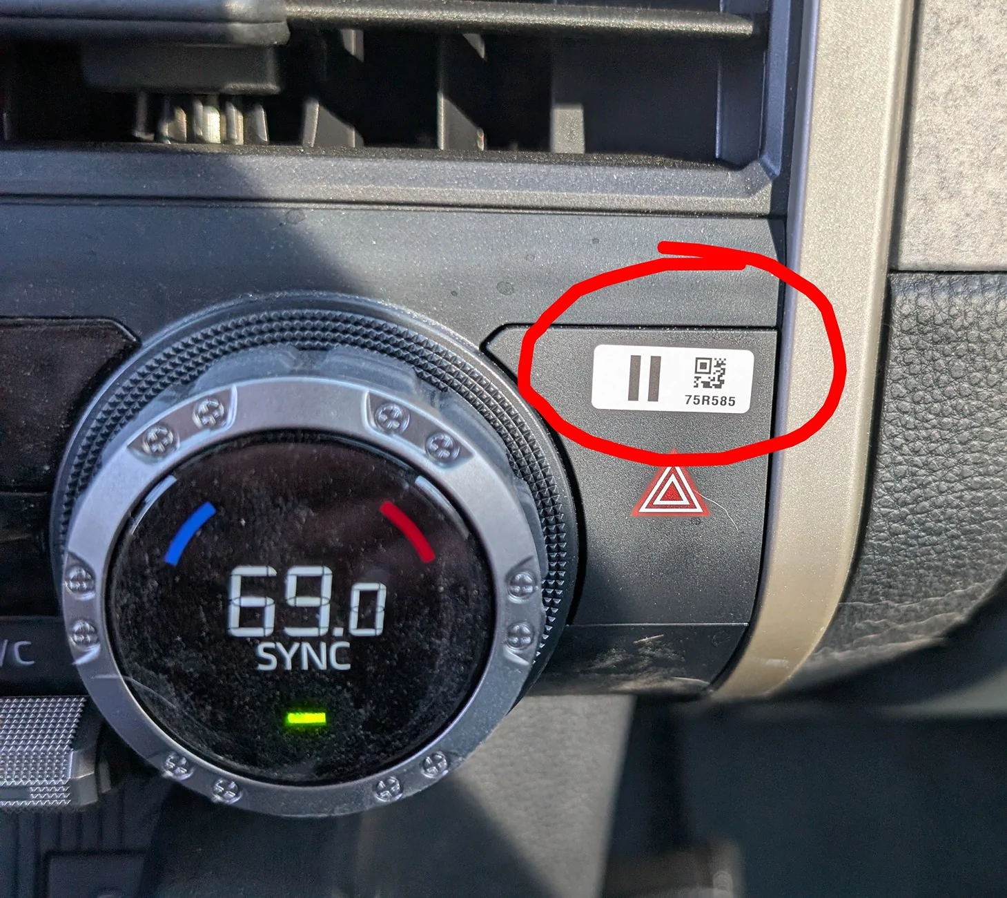 2024 Tacoma What is the purpose of this sticker and QR code on a 2025 Trailhunter? PXL_20251218_192824345~2