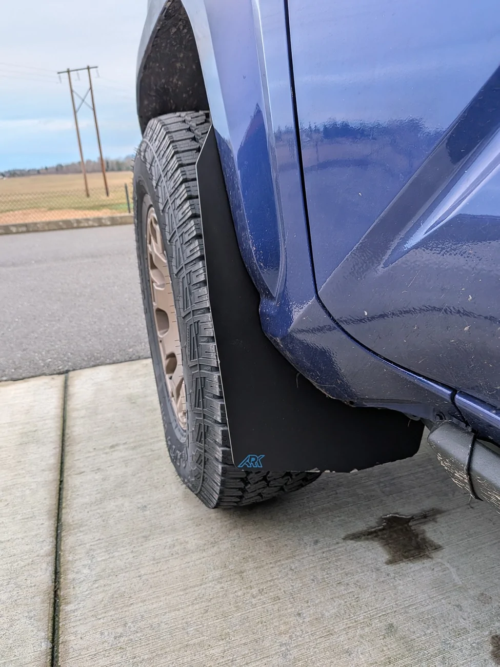 2024 Tacoma ARK Mid Mud Flaps installed PXL_20260102_000429148