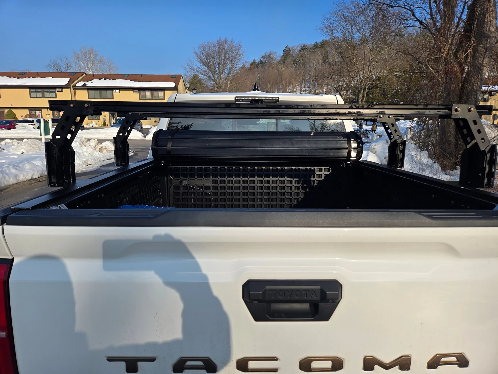 2024 Tacoma Rough Country hard roll up bed cover WITH TRUKD T Series 12.5" Bed Rack Straight Rear open cover