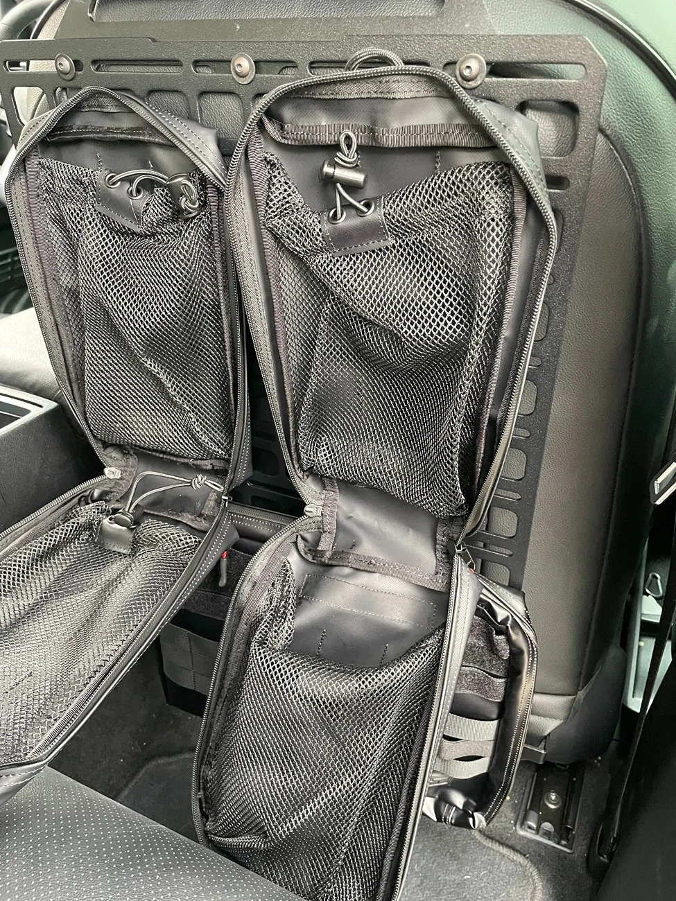 2024 Tacoma BuiltRight Seat Back Tech Plate MOLLE Kit Installed IMG_0383