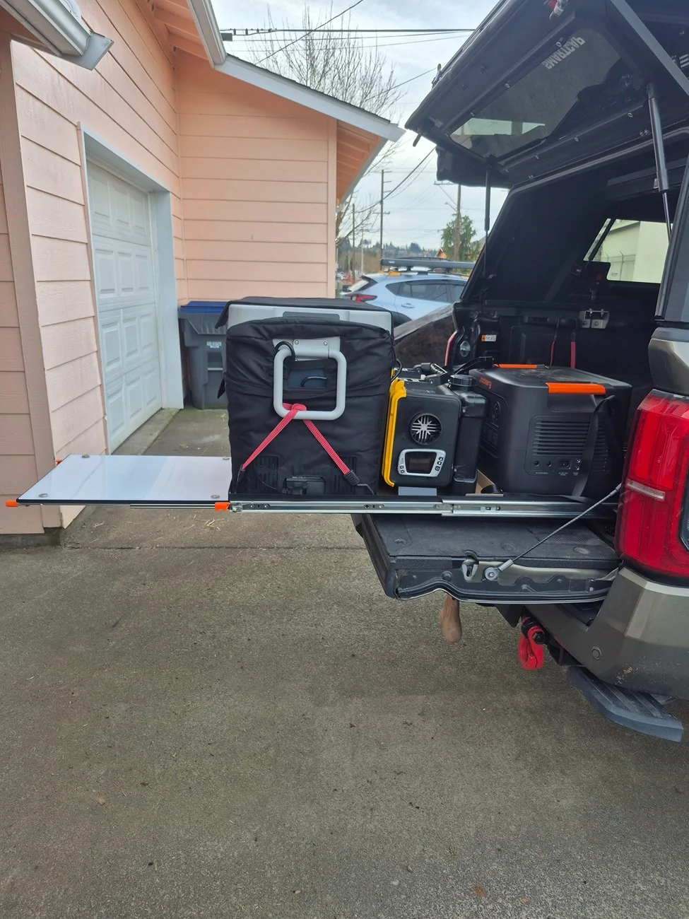 2024 Tacoma All Top Fridge/diesel heater/solar battery slide. 20260331_081924