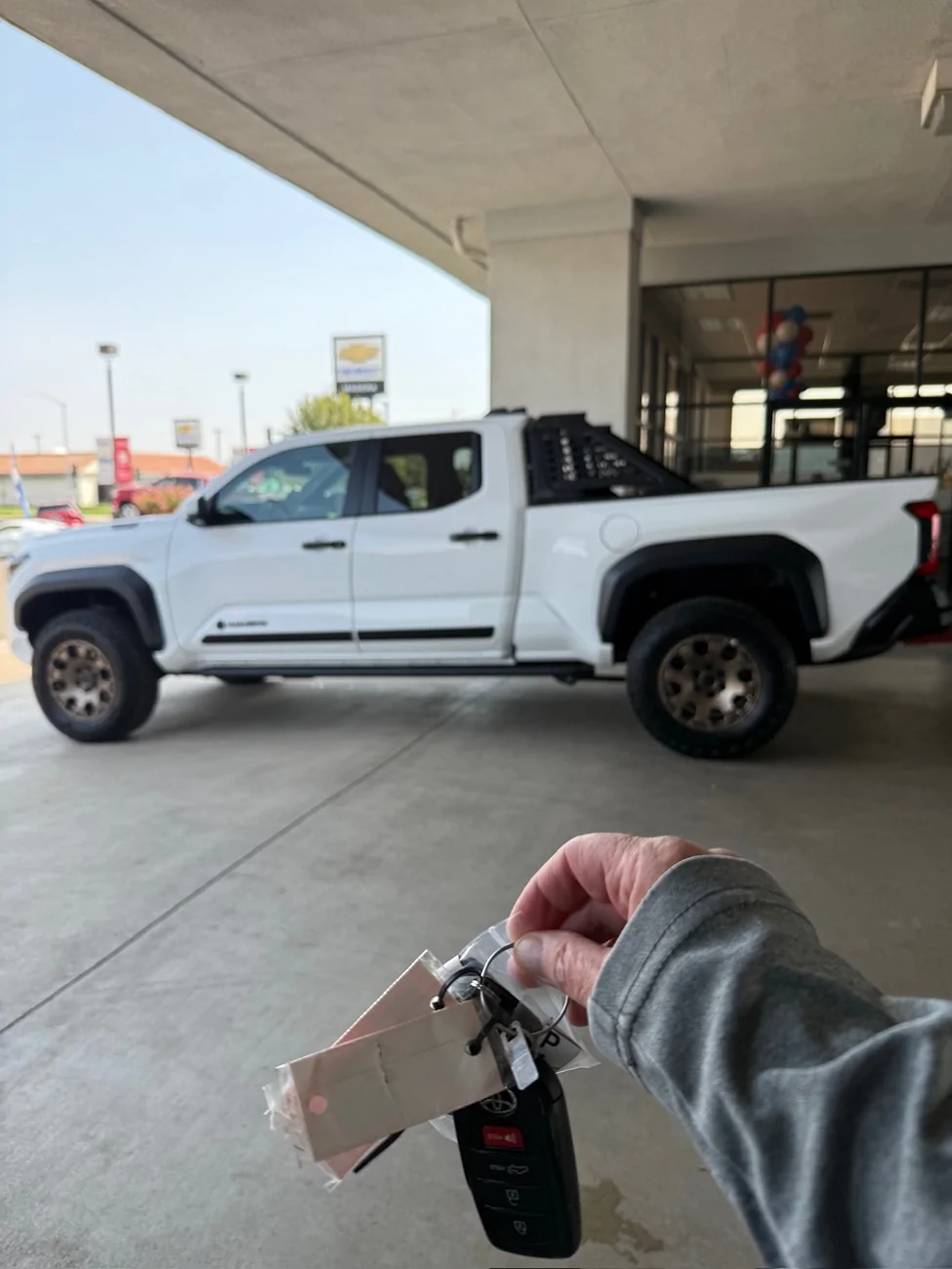 2024 Tacoma Just 2 Pictures: The day you picked it up VS. what your Tacoma looks like now IMG_5017
