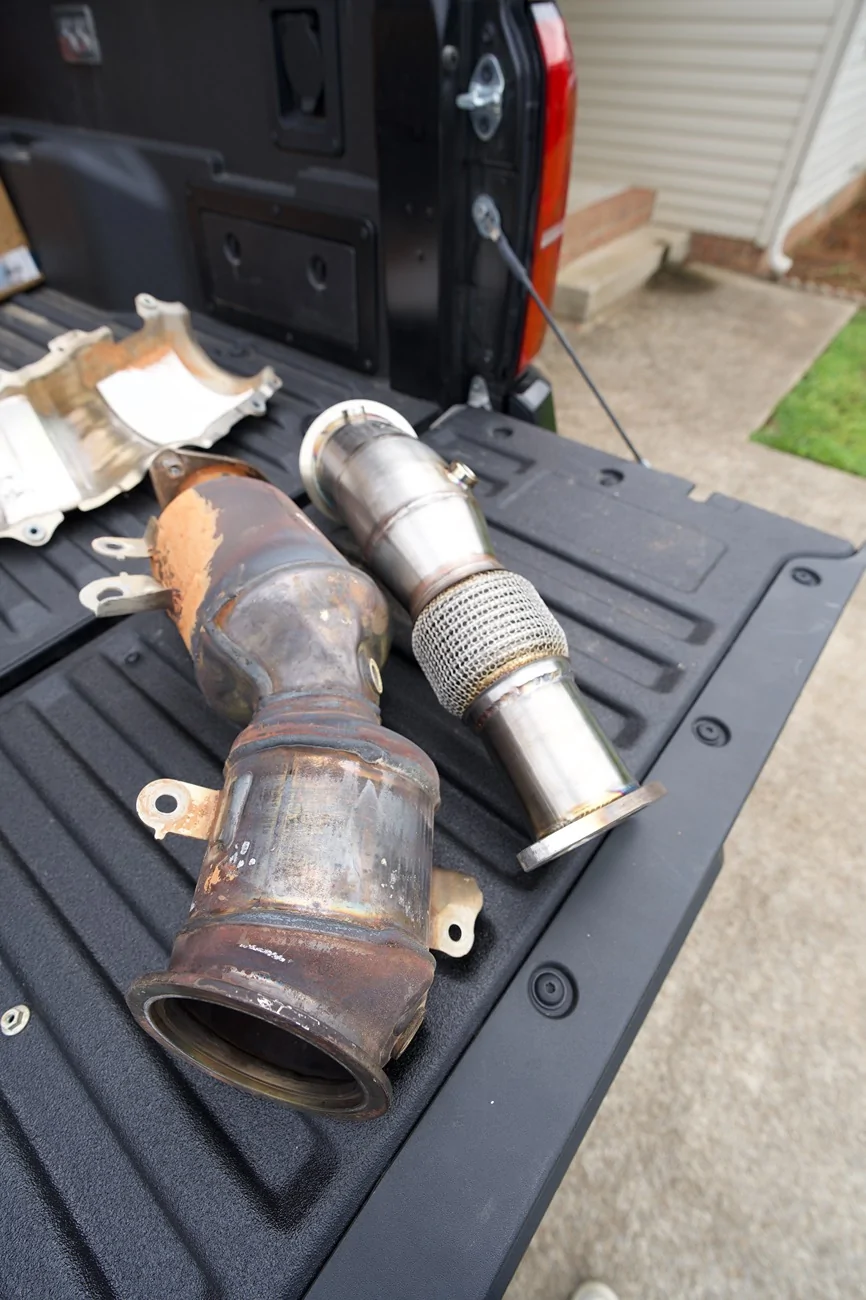 2024 Tacoma OEM downpipe vs. OTT High Flow Catted Down Pipe - side by side comparison DSC01908