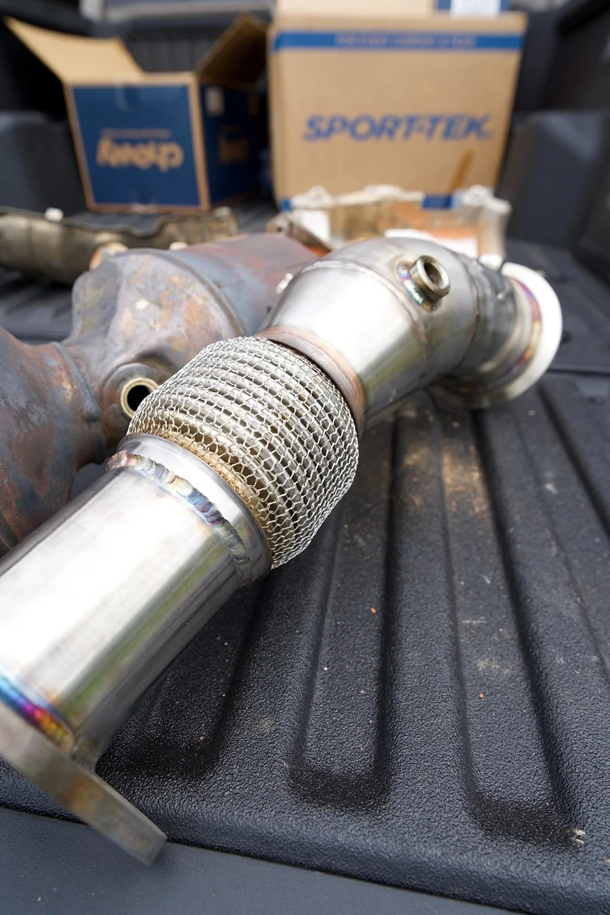 2024 Tacoma OEM downpipe vs. OTT High Flow Catted Down Pipe - side by side comparison DSC01907