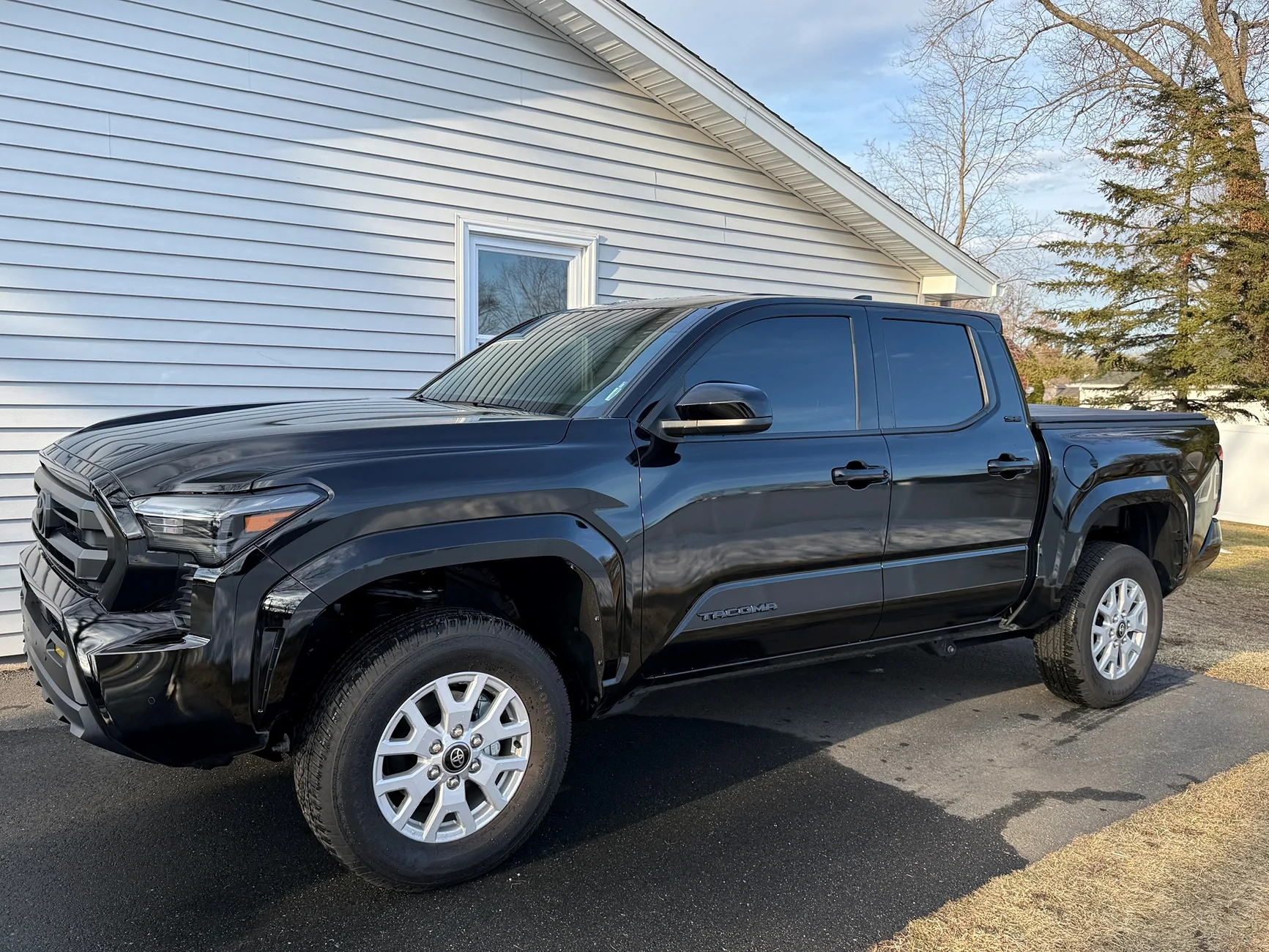 2024 Tacoma Just 2 Pictures: The day you picked it up VS. what your Tacoma looks like now stock