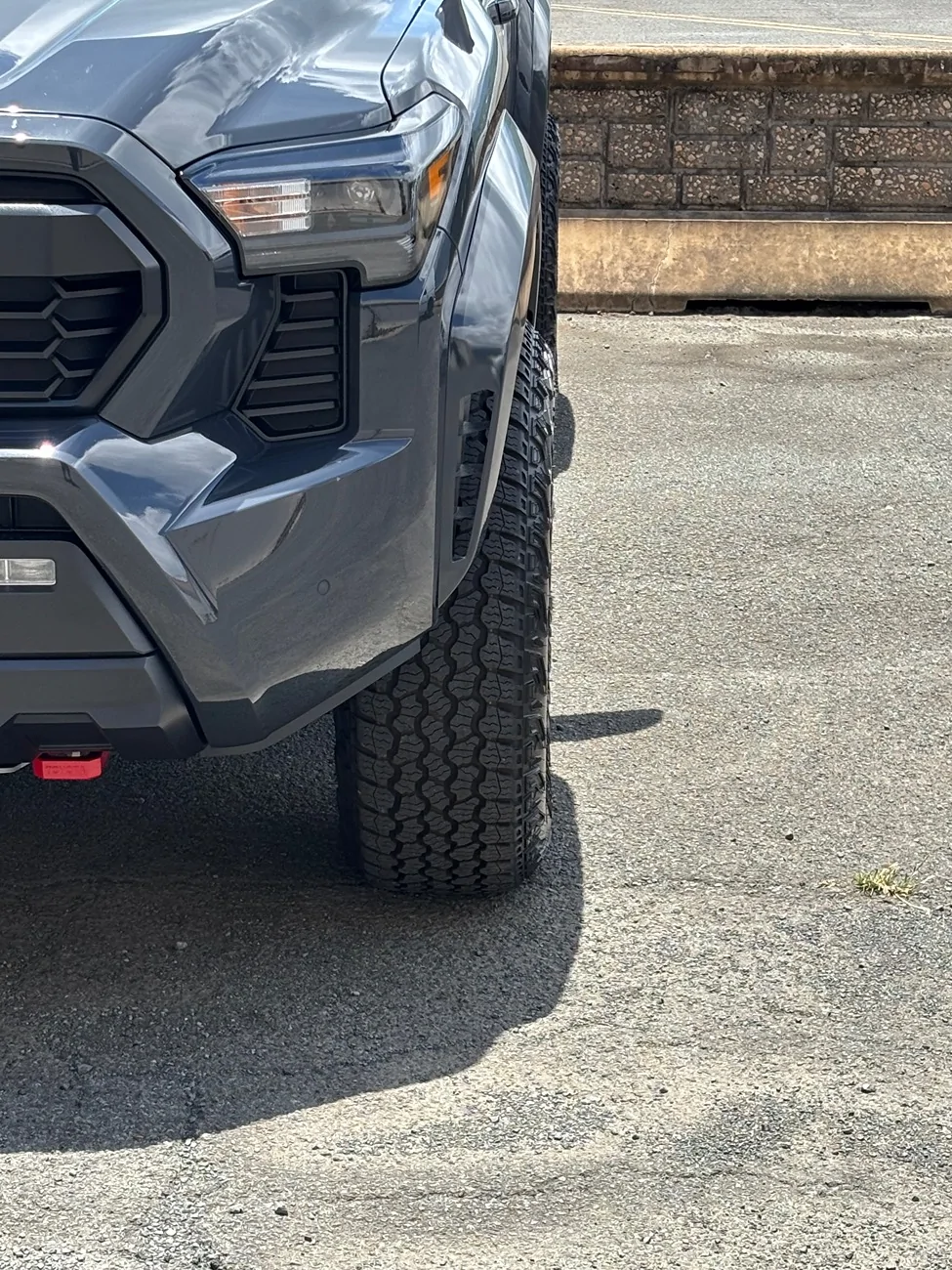 2024 Tacoma OEM mudflaps. Canada vs US. IMG_9724