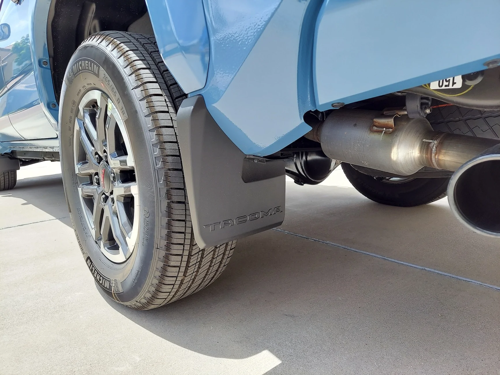 2024 Tacoma OEM mudflaps. Canada vs US. 20260526_120733