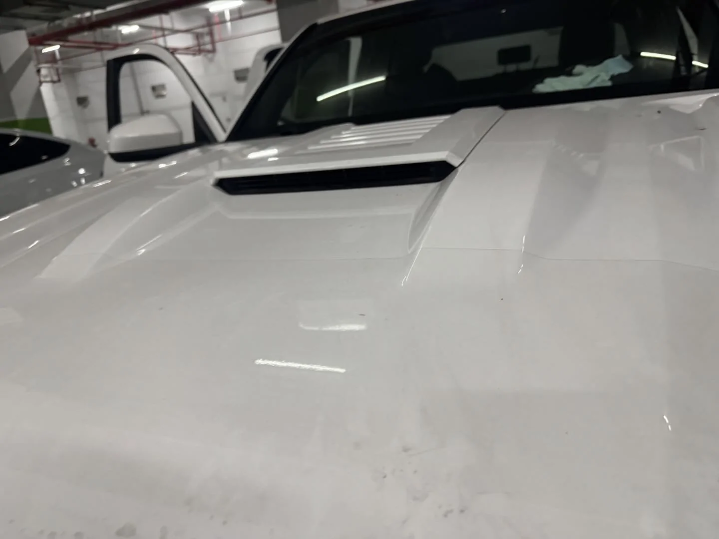 2024 Tacoma Anyone interested in a light here on the hood scoop area? 20260529-145328