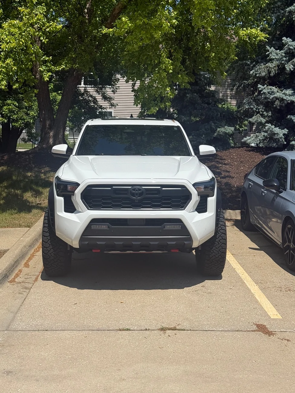 2024 Tacoma Anyone running a factory lift on a TRD Off-Road??? IMG_2764