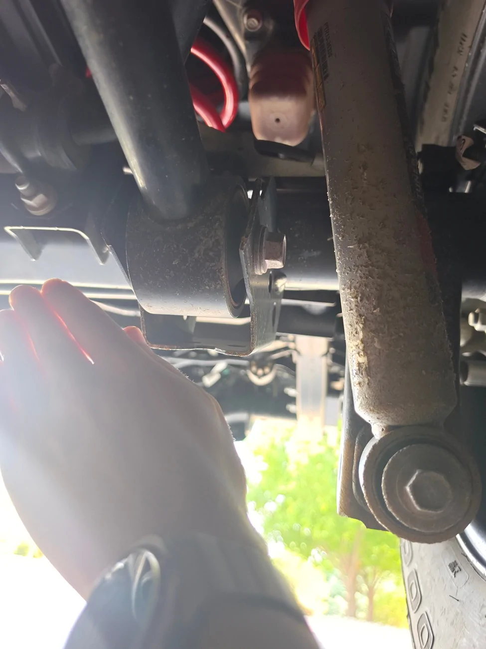 2024 Tacoma Severe Rock/ Gravel chip damage on rear shocks and frame 1733